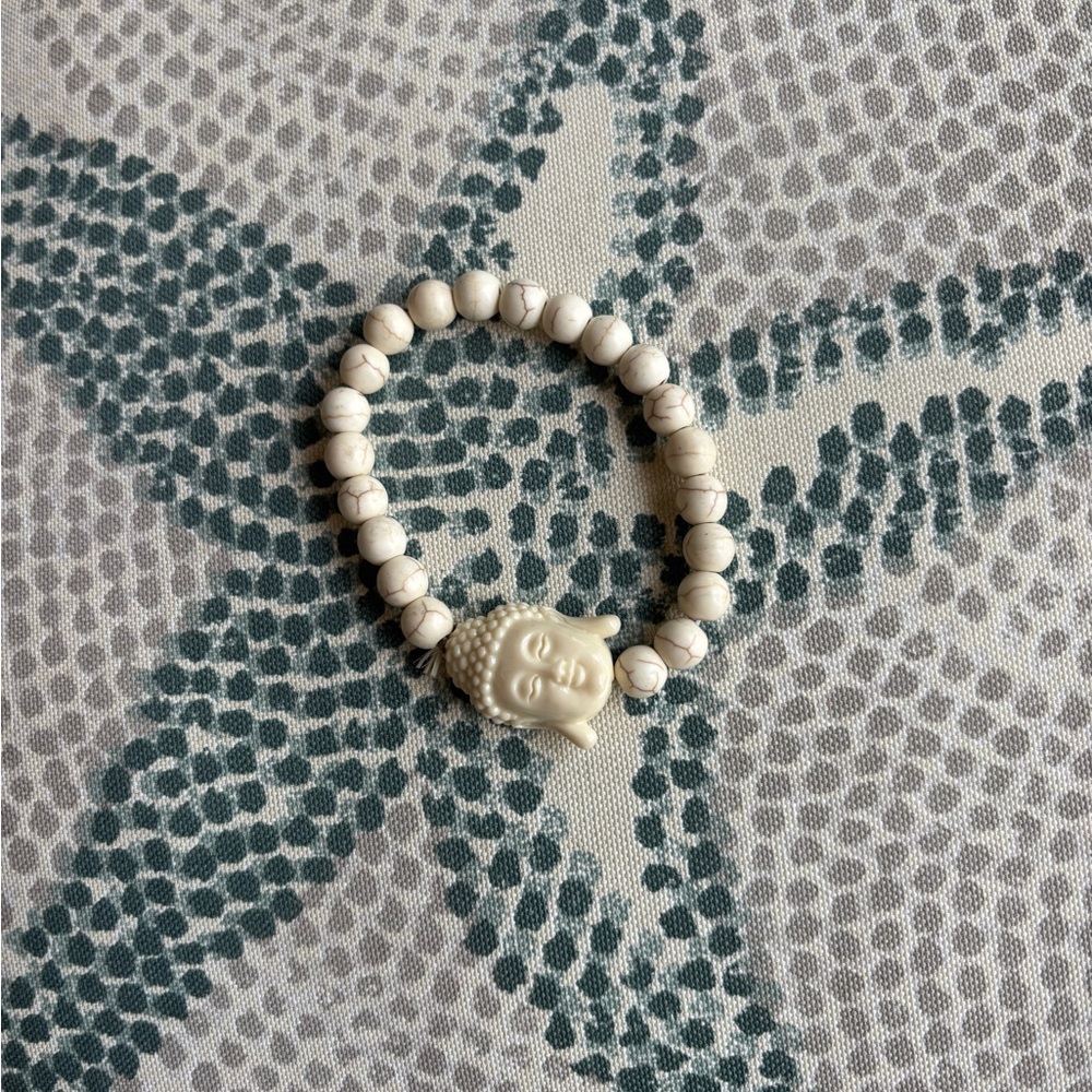 Cream Beaded Bracelet with Buddha Charm